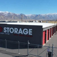 red storage mountains in background