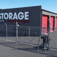 red storage building sign and gate